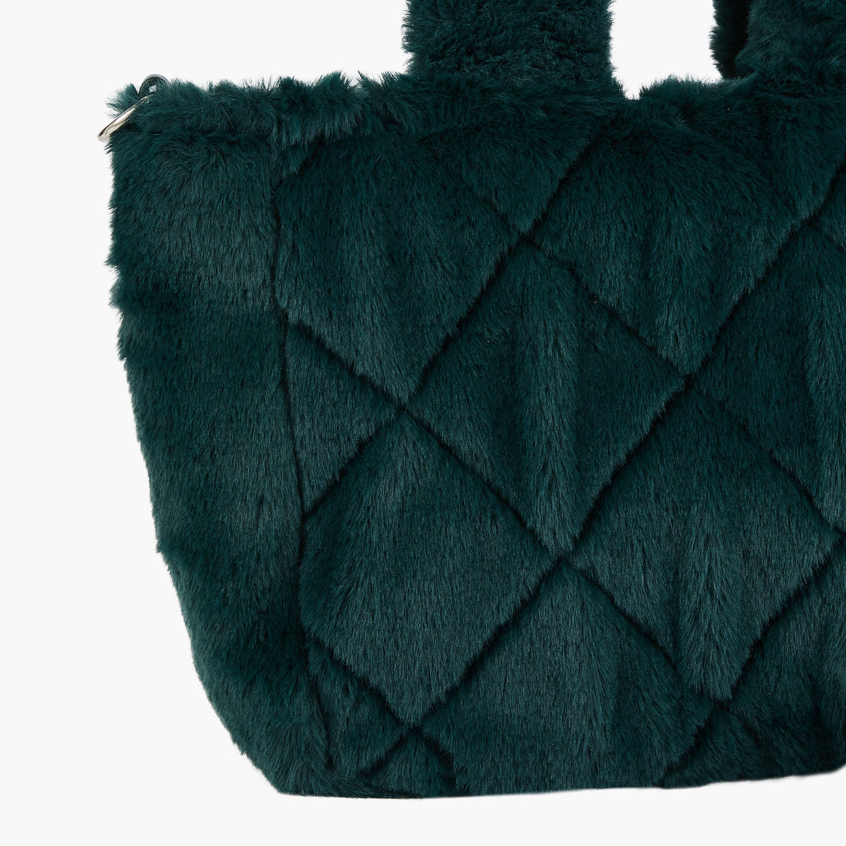 Sac vert en fausse fourrure lurex porté épaule